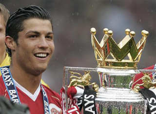 Cristiano Ronaldo holds the premier league cup